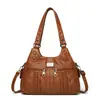 Bolso de piel suave para mujer 2026 nueva moda versátil bolso de hombro para mujer bolso cruzado casual simple de piel lavada