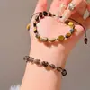 Pulsera de Piedra Ojo de Tigre Irregular Europea y Americana Transfronteriza, Pulsera Tejida Ajustable de Perlas de Piedra Natural Simple y Elegante