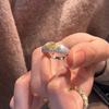Anillo de plata de ley S925 con incrustaciones densas de diamantes en forma de ojo de caballo y diamante amarillo de la suerte, anillo femenino estilo francés de lujo ligero de mediados de la era antigua, grano de arroz de alta calidad
