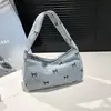 Bolsa de Mão Versátil de Alto Valor de Nicho Feminina Outono 2025 Nova Simples Estilosa Estampada de Veludo Cotelê para Ombro