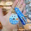 Llavero Creativo Lindo Gato Donut Muñeco Estéreo Cuerda para Teléfono Móvil Llavero de Goma Suave Colgante para Bolso Colgante