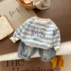 Conjunto de Ropa de Otoño Nuevo 2026 para Niños Sudadera con Rayas Azules y Blancas Dibujos Animados Moda Infantil Cuello Redondo Jeans Casuales Modernos