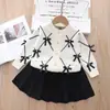 Conjunto de Suéter para Meninas Roupa de Tricô Duas Peças Infantil Novo Estilo de Comércio Exterior Conjunto de Cardigã com Laço para Meninas de 1 a 8 Anos