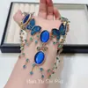 Collar de mariposa azul estilo palacio con borla de gota de agua para mujer, gargantilla para chicas atrevidas, estilo dulce y fresco, cadena para la clavícula versátil de alta gama