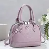 Nuevo bolso cruzado vintage con relieve de concha para mujer, bolso de mano moderno y versátil, bolso de hombro, bolso cruzado, bolso de nicho de moda