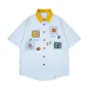 Jia Yi Ku 2026 Verão Camisa Listrada Novo Estilo Vintage Americano Camisa Floral Bordada Divertida para Casal Homens e Mulheres