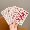 Pegatina de lazo en forma de corazón rojo con pedrería para niñas y niños, soporte de maquillaje con temática de huevo de fuegos artificiales, accesorio de decoración facial