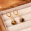 Nuevos Pendientes Colgantes de Calabaza con Piedra Ojo de Tigre Estilo Chino, Sensación de Lujo Ligero y Gama Alta, Pendientes Microincrustados de Circonita, Pendientes de Moda y Elegantes para Mujer