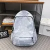 Mochila marca Tide estudiante universitario nicho minimalista estilo ins estudiante de secundaria mochila tendencia de moda mochila de viaje femenina