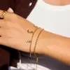 Pulsera Wanxing de Acero Inoxidable Oro 18K Europeo y Americano Ojo de Diablo Luna Circonita Blanca Accesorios de Joyería de Comercio Exterior Transfronterizo