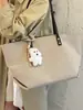Bolso retro sencillo para mujer, nuevo modelo 2026, bolso tote de alta gama, bolso de hombro y axila de gran capacidad para el trabajo