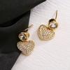 Aogu Moda Transfronteriza Lujo Accesible Chapado en Cobre Oro de 18 Quilates Zirconia Pendientes de Corazón para Mujer Ins Nicho Pendientes Exquisitos Elegantes