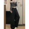 Foto real de los nuevos pantalones de pierna ancha para mujer otoño 2026 con cintura elástica y diseño único, holgados y casuales con una bonita caída 16553