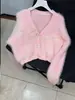 Cárdigan de punto con cuello en V abotonado, imitación de pelo de visón, para mujer, nuevo para otoño e invierno, suéter corto suave con lazo, moderno