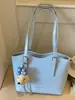Elegante y estiloso bolso nuevo para mujer, tote de gran capacidad, versión coreana 2026, patrón tejido, bolso de hombro casual, moderno