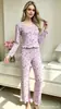 Novo conjunto casual soltinho 2026 para mulheres, estilo doce, estampa floral pequena, conjunto de duas peças de manga longa, roupa de casa feminina 7092