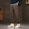 Estilo Novo Primavera e Outono 2025 Calça Casual Imitação de Couro Moda Masculina Tendência Cintura Elástica Perna Solta com Amarração Esportiva Calça Longa Masculina