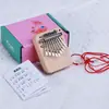 O Professor Ma recomenda o mini piano de polegar de 9 teclas, um pingente de instrumento musical kalimba fofo de madeira maciça para iniciantes e celebridades da internet