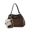Bolso de mano pequeño de otoño transfronterizo para mujer, nuevo modelo 2026, bolso de hombro vintage de alta gama para el trabajo y los desplazamientos, bolso bandolera tipo cubo