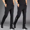 Pantalones casuales gruesos para hombre de primavera y otoño, joggers deportivos holgados de cintura alta de corte slim versátiles con cremallera y perneras rectas