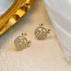 Pendientes redondos de cuerno de dragón con carácter fu de estilo chino retro, elegantes, ligeros, de lujo, con diseño de nicho de alto sentido, exquisitos pendientes tipo botón