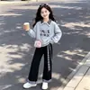 Nueva sudadera de cuadros patchwork para niñas, pantalones casuales y de moda de cuadros patchwork de pierna ancha, atuendo moderno estilo universitario
