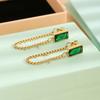 Aretes de cadena larga pulida de acero inoxidable con diamante verde Joyería de lujo ligero para mujer Venta al por mayor Aretes de acero de titanio de moda simple Exclusivo transfronterizo