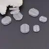 Venta al por mayor de fábrica ventosa Frisbee tapón para el oído almohadilla transparente invisible para el oído sin agujero en la oreja pinza para la oreja pinza para la oreja de rana nueva almohadilla anti-dolor