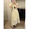 Vestido Tencel MMC DITION con escote cuadrado, mangas abullonadas y un diseño que ciñe la cintura, elegante vestido largo