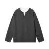 Nueva camiseta de manga larga de otoño, cuello Henley, top de camiseta de manga larga de dos piezas simuladas, camisa base de manga larga suelta de moda para hombre