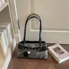 Bolso de Hombro Estilo Chica Hot Retro 2026 Verano Nuevo Bolso de Mano para el Trabajo Bolso de Hombro Relajado y con Estilo