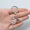 Llavero colgante retro de aleación del Árbol de la Vida con trébol de la suerte y letra, accesorio para mochila, superventas transfronterizo de Amazon