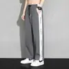 Pantalones de seda de hielo transfronterizos 2026, nueva colección de verano para hombre, ligeros, de secado rápido, de pierna ancha, fluidos, versátiles, pantalones largos deportivos, pantalones casuales