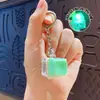 Llavero colgante de Tetris de nueve teclas de moda en colores macaron, accesorio de juguete de botón para aliviar el estrés, venta al por mayor