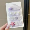Accesorios para el cabello de velcro de dibujos animados dulces y lindos para mujer, de alta calidad y elegantes para el uso diario, nuevo diseño floral 2026, pegatinas para flequillo de niños