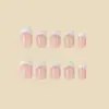 Uñas postizas clásicas blancas estilo francés con base nude, 24 piezas, estilo de moda europeo y americano