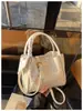 Bolsa de Braço Estilo Francês de Luxo Leve Feminina 2026 Nova Tendência de Verão Diária Textura de Alta Qualidade Moda Ombro Único Transversal Bolsa para o Dia a Dia