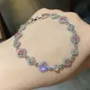 Pulsera Redonda Geométrica de Circonita Color Café Dorado Lujo Ligero para Mujer Atmósfera de Alta Gama Pulsera de Trébol de Cuatro Hojas Pulsera de Celebridad de Internet Joyería de Mano de Celebridad de Internet