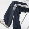 Pantalones Deportivos de Tres Rayas Americanos para Hombre Otoño/Invierno Nuevos de Calle Versátiles de Pierna Ancha Pantalones de Chándal de Marca de Moda Talla Grande Casuales
