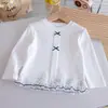 Top de punto dulce para niñas 2026 Primavera y Otoño Nuevo Estilo Coreano Lazo Versátil Encaje Patchwork Camisa Básica