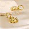 Estilo Vacacional Bohemio Explosiones Moda Relieve Pendientes de Girasol Acero Inoxidable Pendientes Forma de Pavo Real Oro de 18K