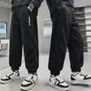 Calças de outono para meninos de roupas infantis 2024 novas calças esportivas primavera e outono meninos crianças médias e grandes outono calças da moda de outono