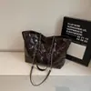 Invierno 2025 Nuevo Moda Coreana Retro Tendencia Nicho Bolso de Hombro Único para Mujer Bolso Acolchado Bolso Texturizado para la Axila