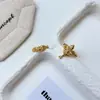 Nuevo Anillo Colgante de Flor de Iris Cruzada con Circonita de Estilo Minimalista Retro de Nicho para Mujer, Anillo Abierto Versátil de Gama Alta para Mujer