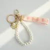 Nuevo Llavero Colgante de Perlas y Cinta DIY Joyería para Mujer Bolso Llave de Coche Cadena Colgante de Cinta Creativa