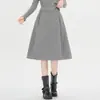 Saia de lã engrossada para mulheres, novo estilo outono e inverno, cintura alta, petite, evasê, bufante, saia tulipa, saia midi