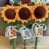 Flor artificial terminada con limpiapipas de girasol, simbolizando el éxito en el examen de ingreso a la universidad y el examen de ingreso a la preparatoria.