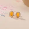 Pendientes Yilu de Plata de Ley S925 Chapados en Oro Ámbar Rojo Agua Rojo del Sur Moda Simples Elegantes Facetados Versátiles Joyería de Plata