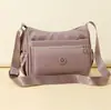 Moda Otoñal 2026 Transfronteriza Versátil Casual Bolso de Nailon Ligero Multibolsillos Bolso de Hombro Cruzado