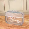 Bolsa de aseo de PVC con lunares al por mayor Bolsa de almacenamiento para el hogar acolchada Bolso de mano transparente con cremallera Bolsa de regalo Bolsa de cosméticos Personalización